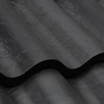 Close-up of dark gray, wavy roof tiles with a matte finish, showing the texture and undulating pattern of the overlapping material.