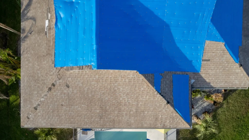 Temporary roof tarping